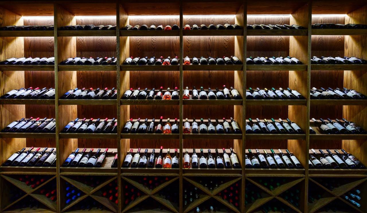 Gudauri Lodge Екстериор снимка Wine bottles in a wine rack